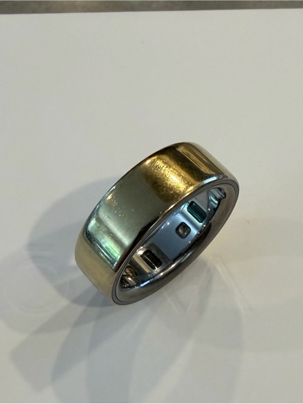 Oura Ring 4 Gold Exterior with Silver Interior - Picture 4 of 5